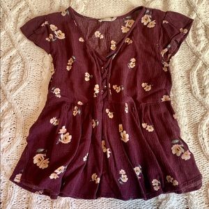 {Chloe & Katie} Floral Peplum Lace-up Top